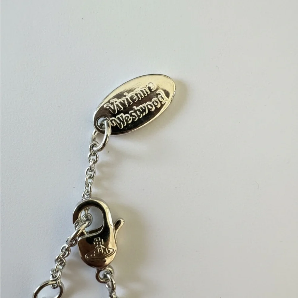 Authentic Vivienne Westwood Black and  Silver Bracelet